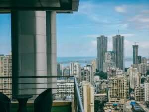 Modern City Skyline with Ocean View and Skyscrapers